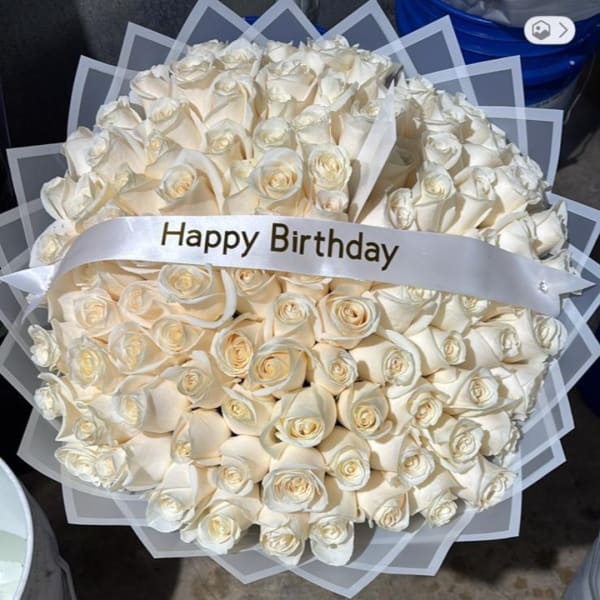 Bouquet of white roses with a Happy Birthday ribbon