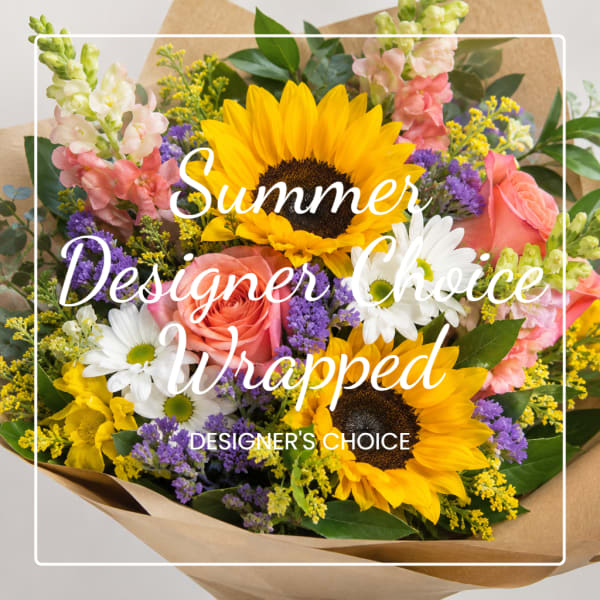 Wrapped bouquet with sunflowers, roses, daisies, and purple filler flowers