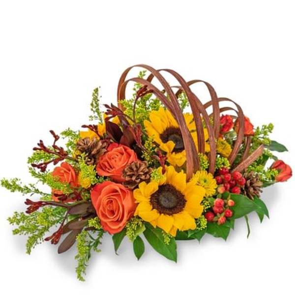 Basket arrangement with orange roses and yellow sunflowers