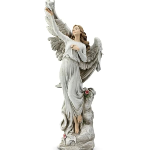 Decorative angel statue in a white robe with raised wings