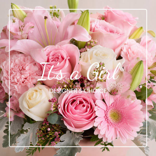 Pink and white floral bouquet with roses, lilies, carnations, and a gerbera daisy