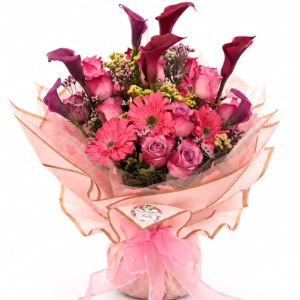 Pink and purple mixed bouquet with roses, gerberas, and calla lilies