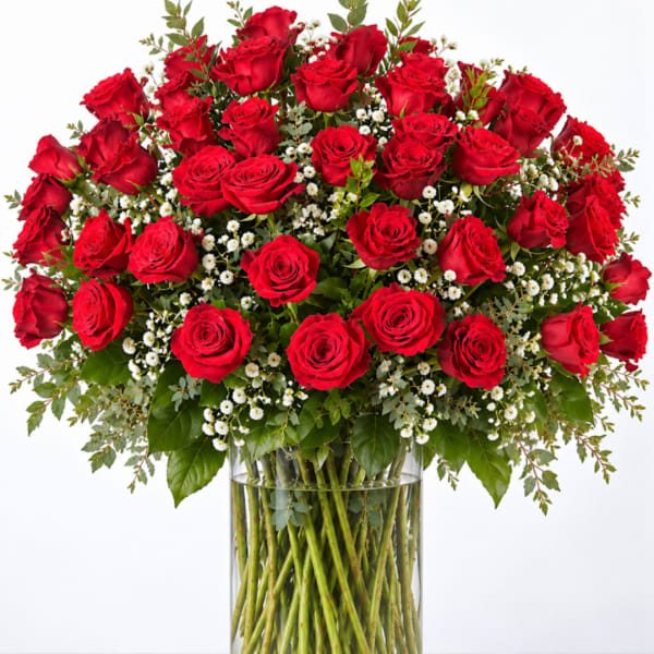 Bouquet of red roses in a clear glass vase