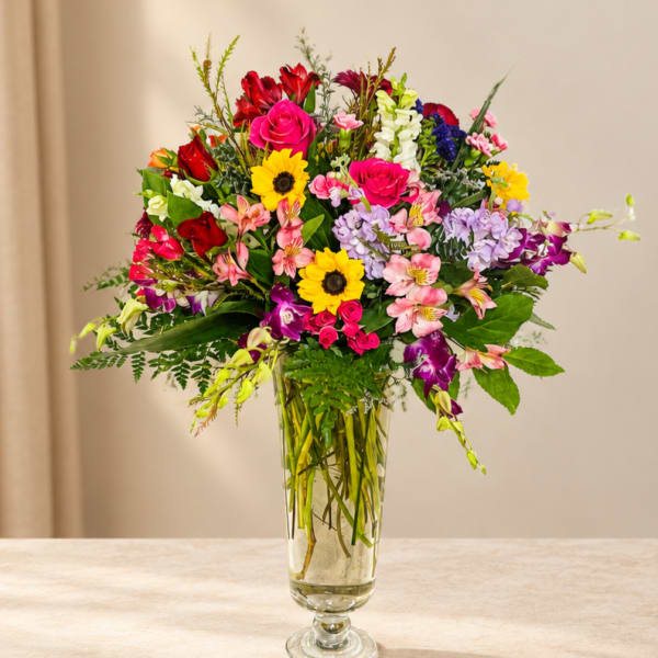 Colorful mixed bouquet in a clear glass vase