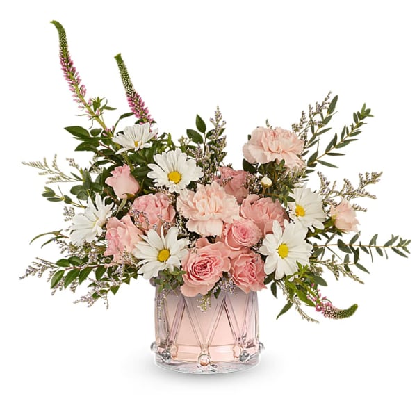 Pink and white bouquet in a clear glass vase