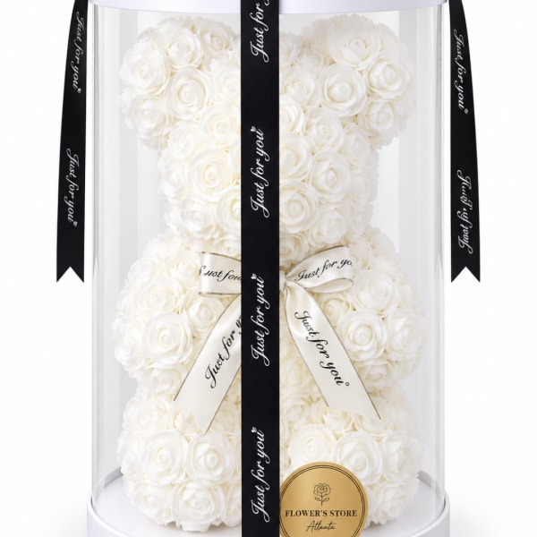 White rose teddy bear in a clear display dome with ribbon