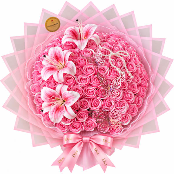 Pink rose bouquet with lilies, pearls, butterflies, and a pink ribbon