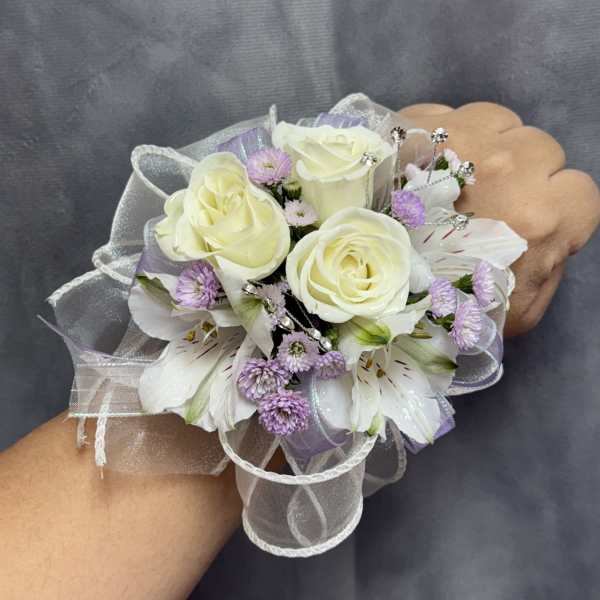 White lavender alstroemerias spray roses corsage