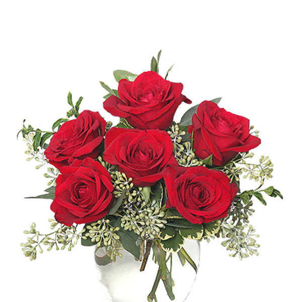 Bouquet of red roses in a clear glass vase