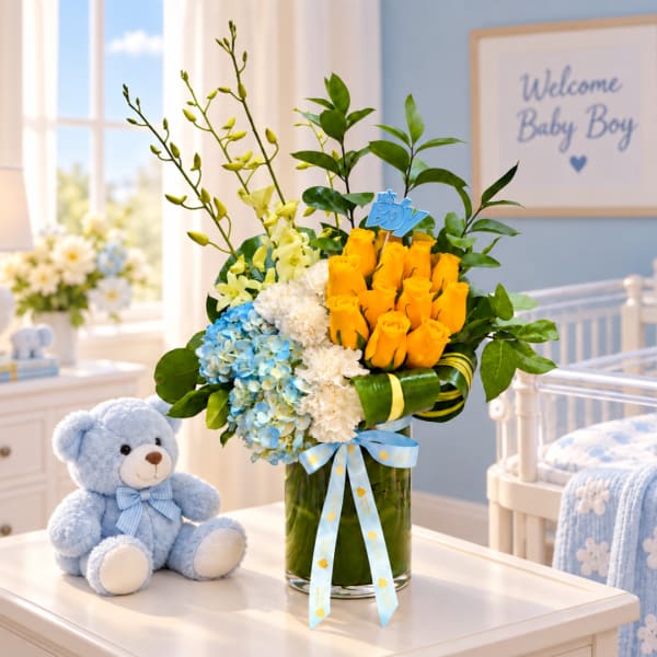 Yellow roses and blue hydrangeas in a glass vase with a teddy bear
