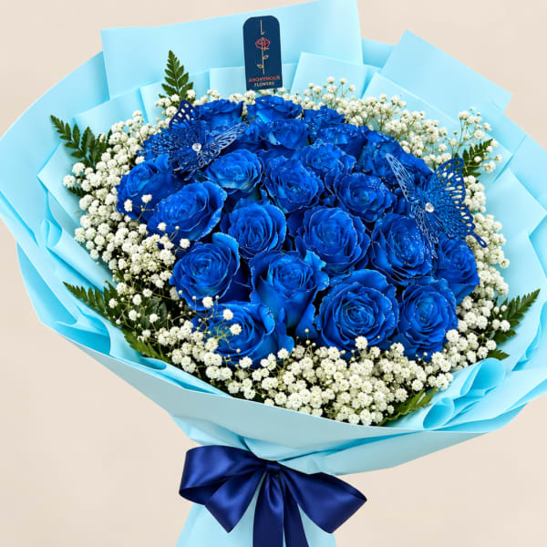 Bouquet of blue roses with white baby's breath in light blue wrap