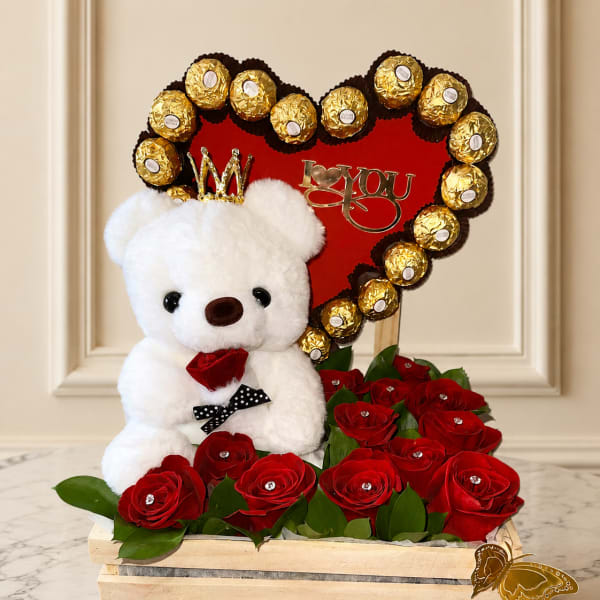 Beautiful design of a box with a bear, heart, Ferrero Rocher chocolates, and roses.