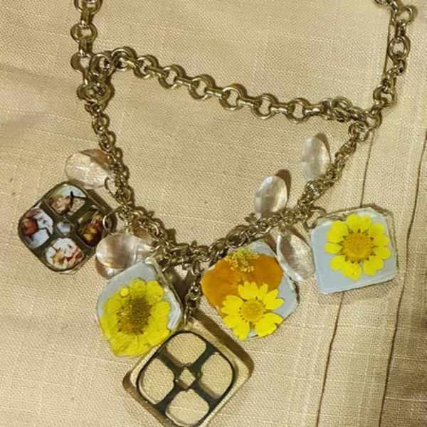 Resin and Daisy Alice in wonderland themed charm necklace