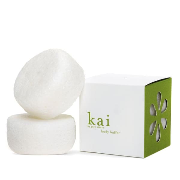 Two white bath bars beside a green-and-white box