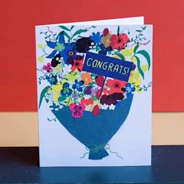 Greeting card with a colorful flower bouquet and "CONGRATS!" text