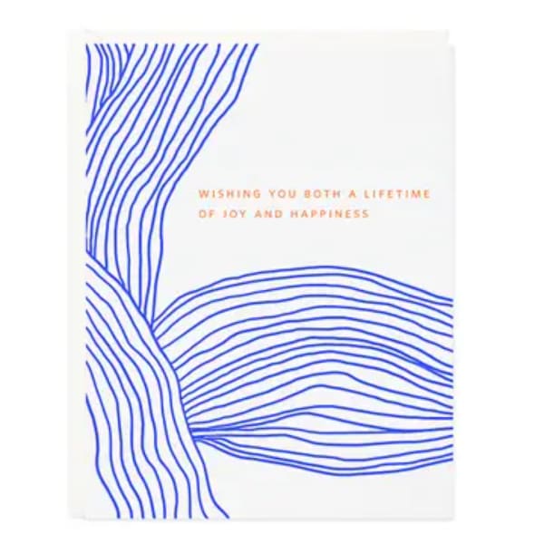 White greeting card with blue wavy lines and a short message