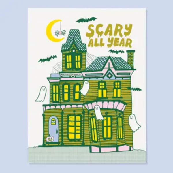 Halloween card with a haunted house and the words "Scary All Year"