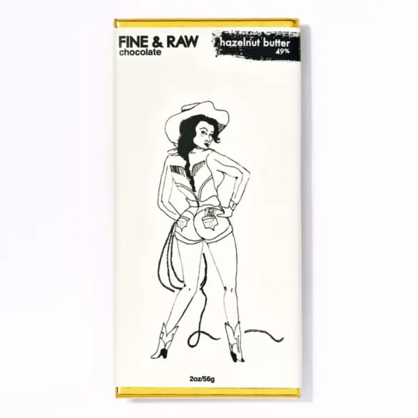 Chocolate bar wrapper with a black line drawing of a cowgirl