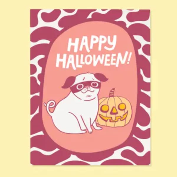 Halloween card with a dog and jack-o'-lantern illustration