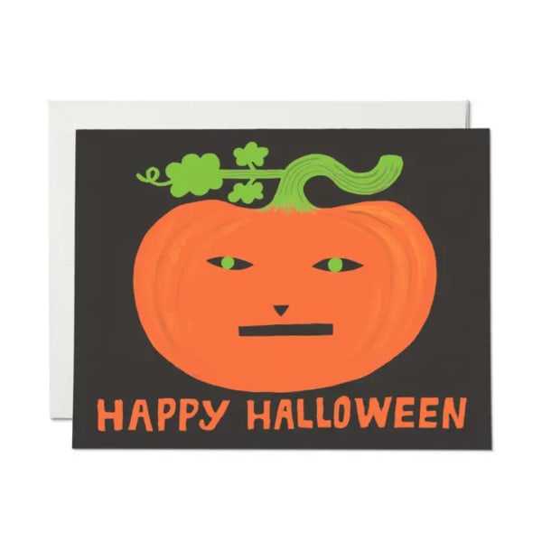 Halloween card with an orange pumpkin face and "Happy Halloween" text