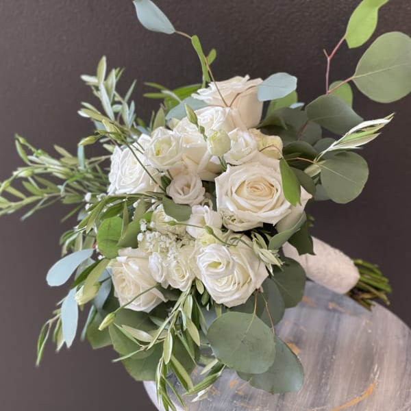 White rose bouquet with eucalyptus and greenery