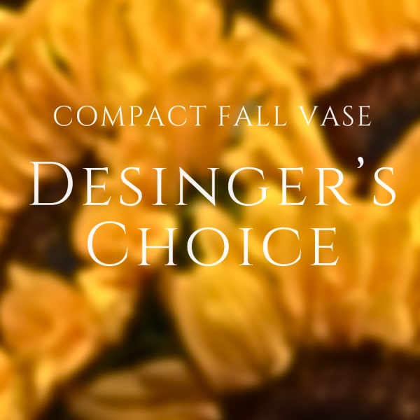 Blurred yellow-orange flowers with the text "Compact Fall Vase Designer's Choice"