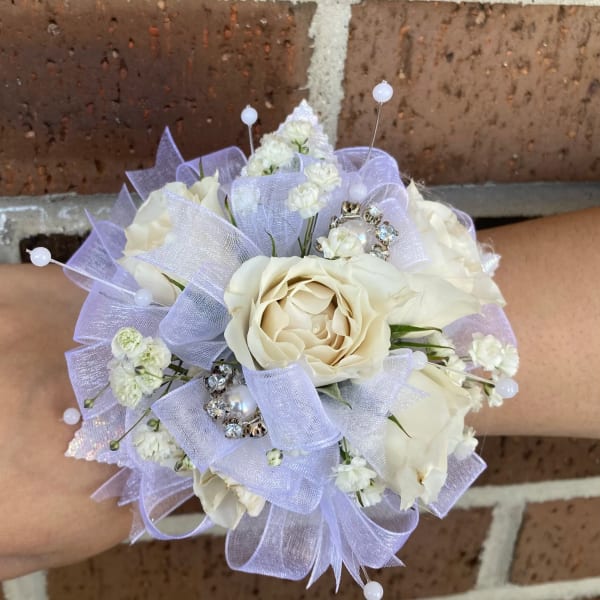 Small white rose bouquet with lavender ribbon and pearl picks