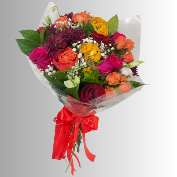 Bouquet of multicolored roses with a red ribbon wrap
