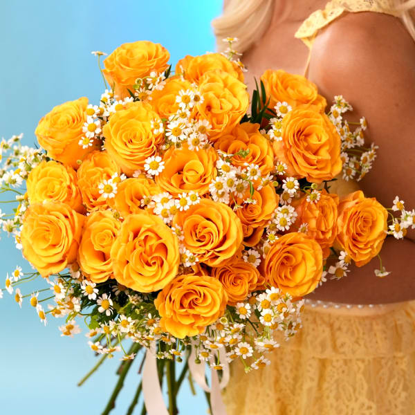 Bouquet of orange roses with small white daisies
