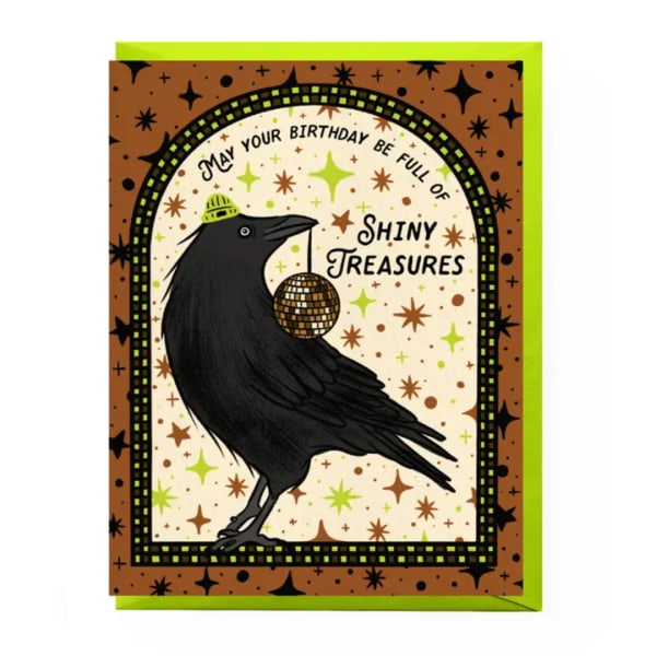Birthday card with a black crow holding a disco ball and the words "May your birthday be full of shiny treasures"