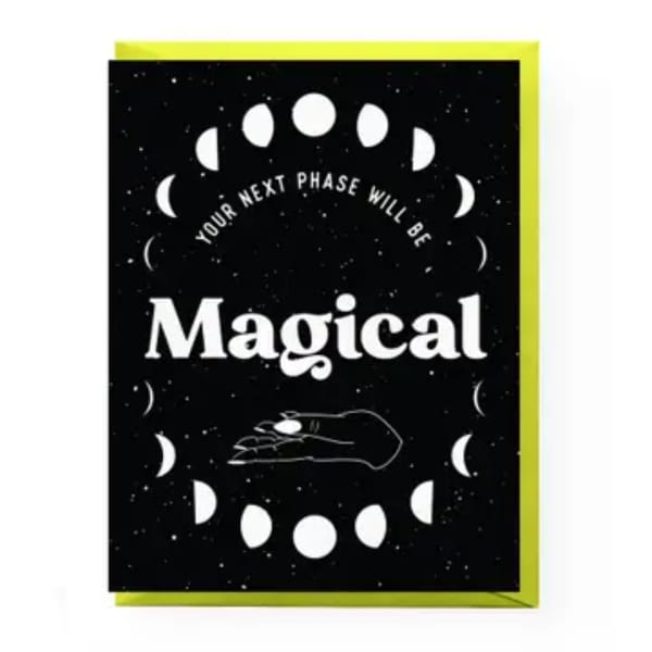 Black greeting card with moon phases and the word "Magical"