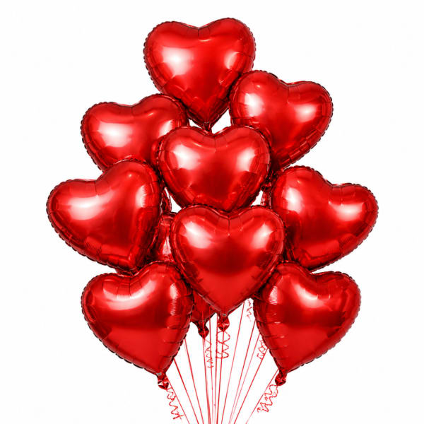 Cluster of red heart-shaped balloons on white background