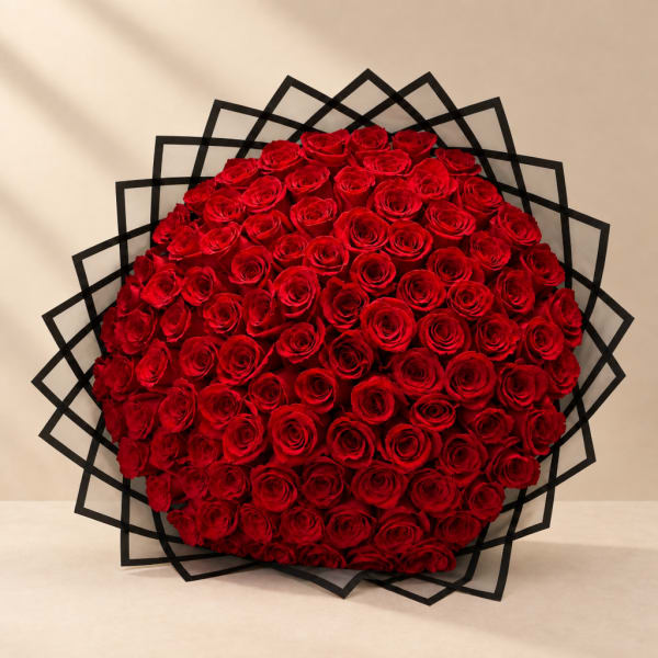 Large bouquet of red roses with black geometric wrap