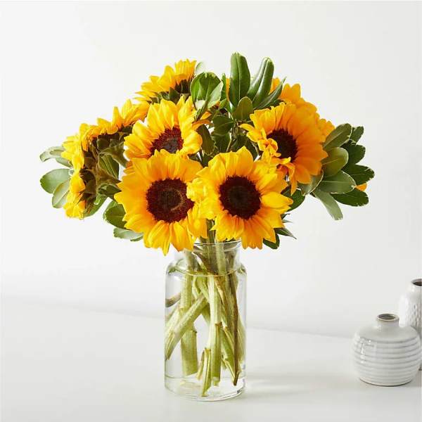 Sunflower bouquet in a clear glass vase