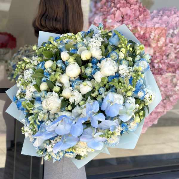 Peonies bouquet in blue
