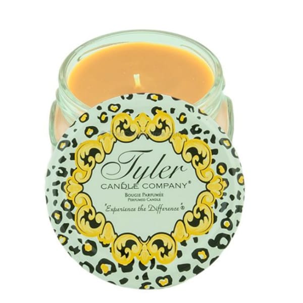 Glass jar candle with a leopard-print label
