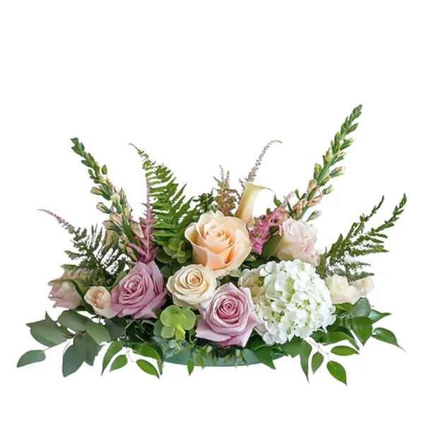 Pastel rose and hydrangea arrangement with fern accents