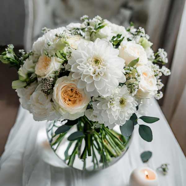White and blush bridal bouquet with roses and dahlias