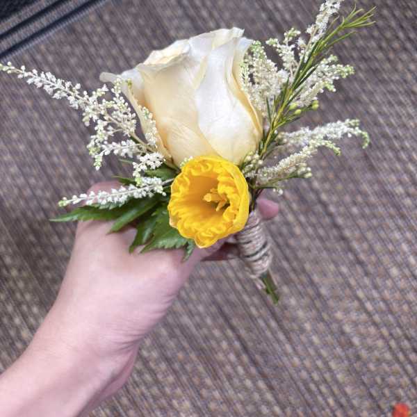 Small hand-tied bouquet with a white rose and yellow tulip