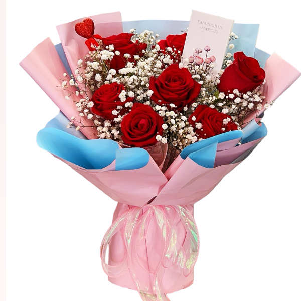 Bouquet of red roses with baby's breath in pink and blue wrapping
