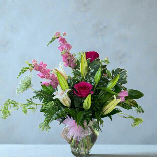 Pink and white mixed bouquet in a glass vase