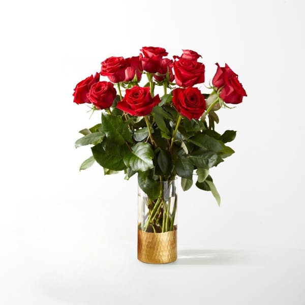 Bouquet of red roses in a clear glass vase