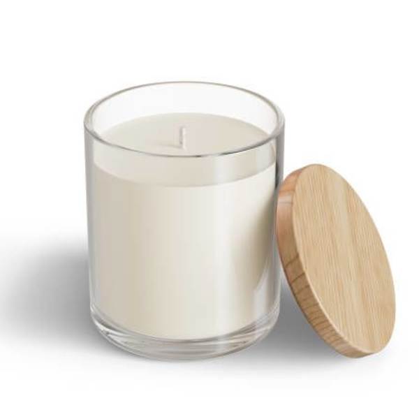 White candle in a clear glass jar with a wooden lid