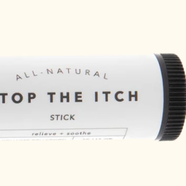A white and black stick labeled "Stop the Itch"