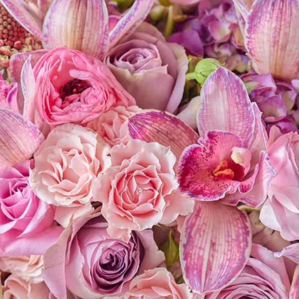 Pink and lavender bouquet with roses and orchids
