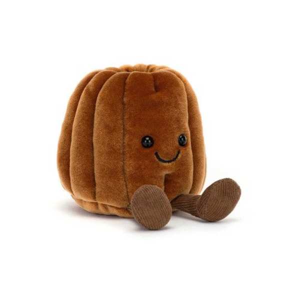 Brown plush pumpkin toy with a smiling face and dangling legs
