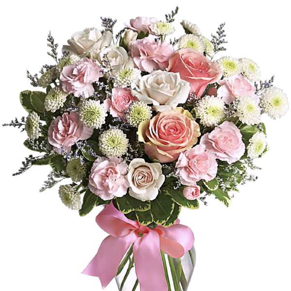 Pink and white rose bouquet in a clear glass vase with a pink ribbon