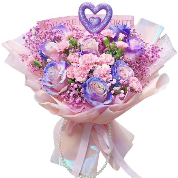 Pink and lavender bouquet with roses and carnations, wrapped in pink paper