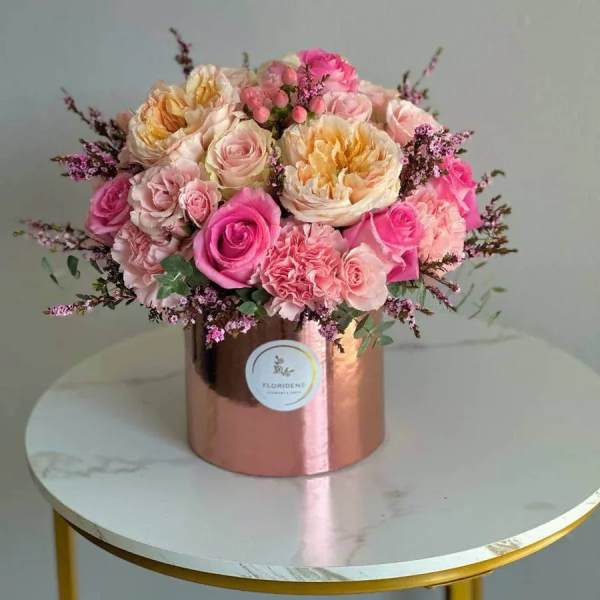 Pink and peach rose bouquet in a metallic rose-gold box