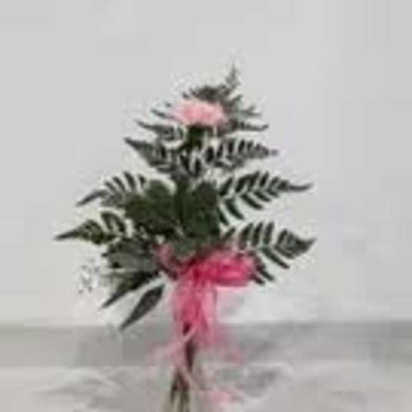 Small bouquet with pink flowers and striped foliage tied with a pink ribbon